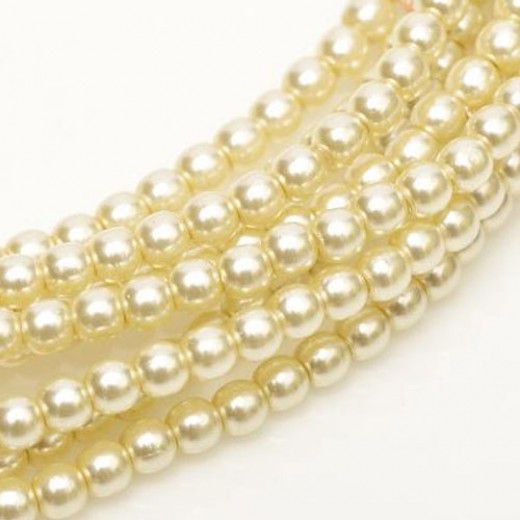 A Bulk bag of 300 round glass pearls in 8mm Old Lace colour.