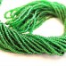 11/0 Medium Green Transparent Charlottes, approx. 22g