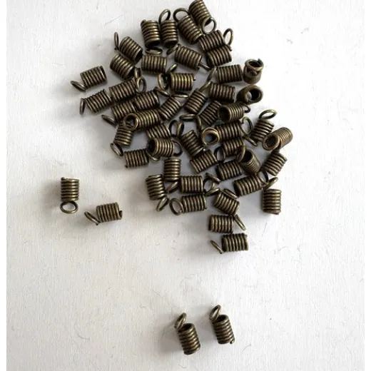 Spring Cord Ends, Brass Colour, Pack of 50 pcs. Spring Cord Ends, Brass Colour, Pack of 50 pcs.