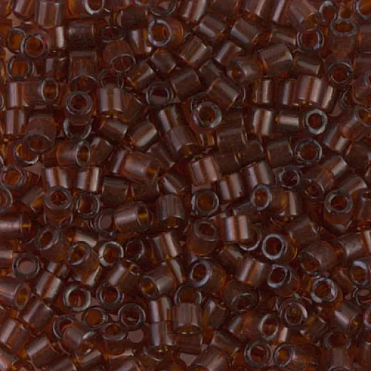 DBL0709 Transparent Dark Topaz size 8/0 Miyuki Delica Beads, Colour 0709, 5.2g approx. DBL0709 Transparent Dark Topaz size 8/0 Miyuki Delica Beads, Colour 0709, 5.2g approx.