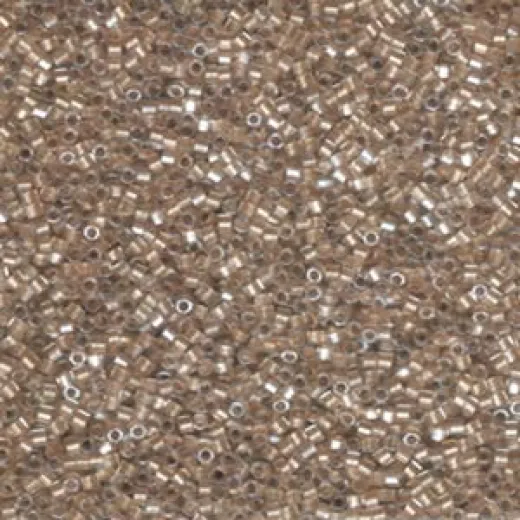 Light Bronze Lined Crystal, Colour Code 0907, Size 11/0 Cut Miyuki Delica Beads, 5.2g approx. Light Bronze Lined Crystal, Colour Code 0907, Size 11/0 Cut Miyuki Delica Beads, 5.2g approx.