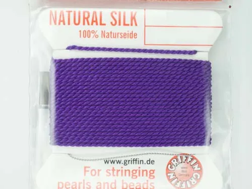 Close up of reel of Griffin Silk Cord Thread in Amethyst