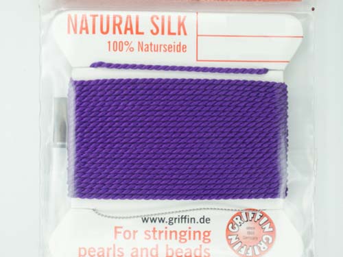 Close up of reel of Griffin Silk Cord Thread in Amethyst