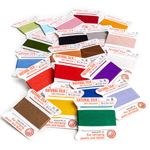 Pile of colourful Griffin silk cord cards